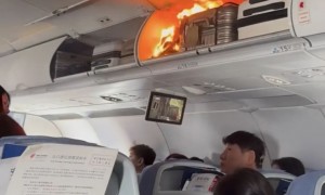 杭州飞韩国一航班因锂电池自燃备降,亲历者:客舱都是烟,行李架被熏黑